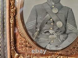 6th plate tintype of a Union freckled-face infantry sergeant, 2x armed