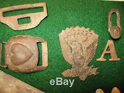 Antique Civil war dug itemsJefferson Davis hat Badge