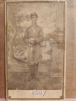 CDV of Iconic Federal cavalryman with sabre drawn, forage cap and cavalry boots