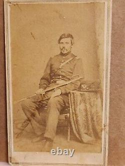CDV of officer complete with sword and hat with an ostrich plume Louisville, KY