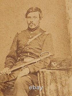 CDV of officer complete with sword and hat with an ostrich plume Louisville, KY