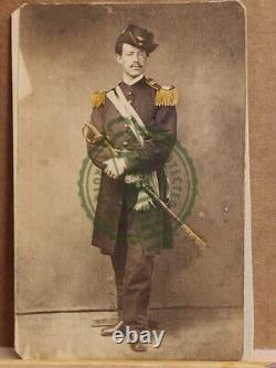 Cdv of dashing unidentified nicely tinted captain with epaulets, and sword