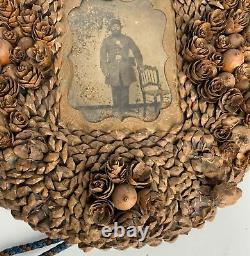 Unusual Civil War soldier tintype in an Acorn & seed tramp art style frame